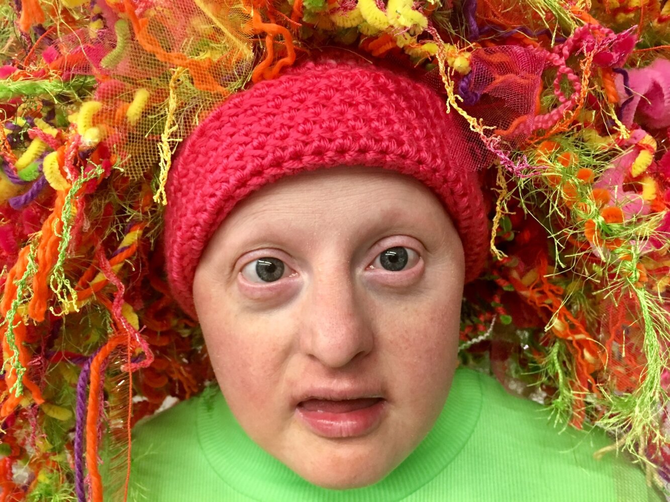 Jill close up with colorful wig