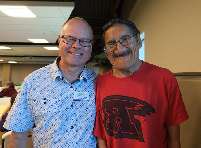 Strategic Direction planner CEO Brad Saathoff smiling with a participant.